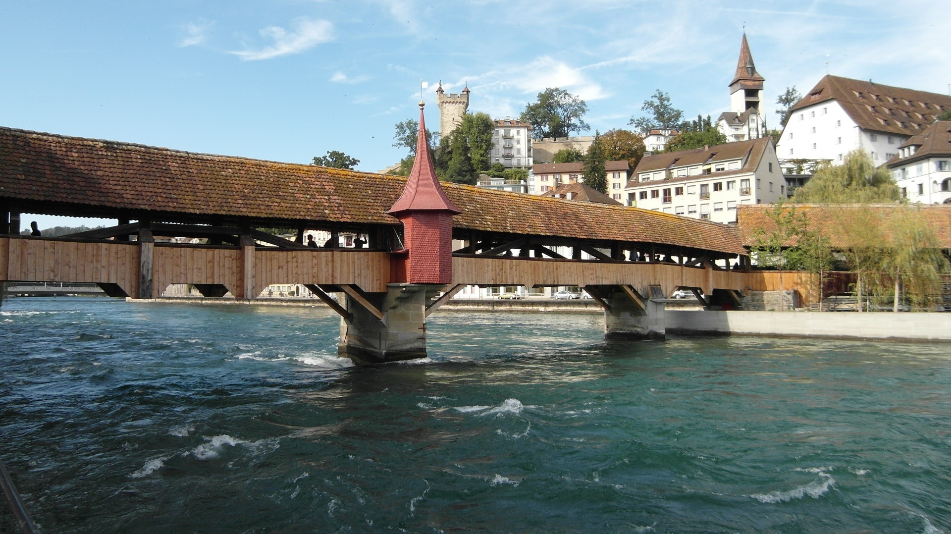 Luzern: Spaziergang mit dem Sensenmann auf der Spreuerbrücke